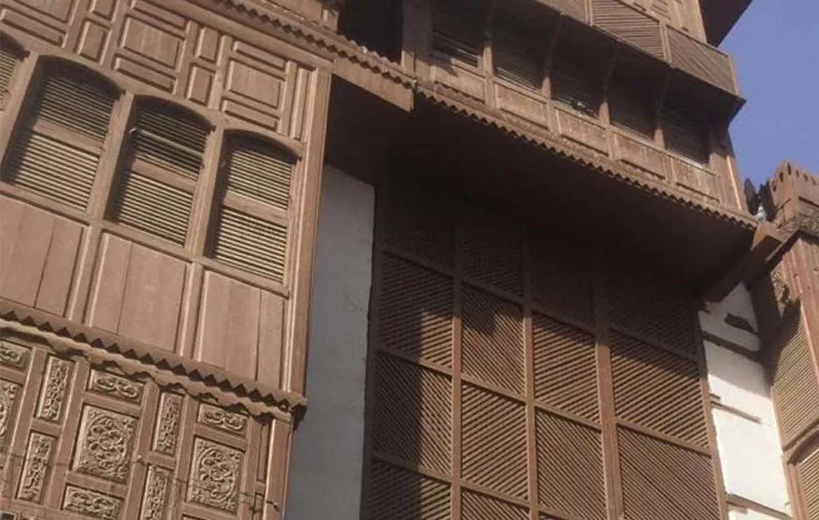 A traditional mashrabiya in Arabic street – an oriel window that allows air flow inside the building